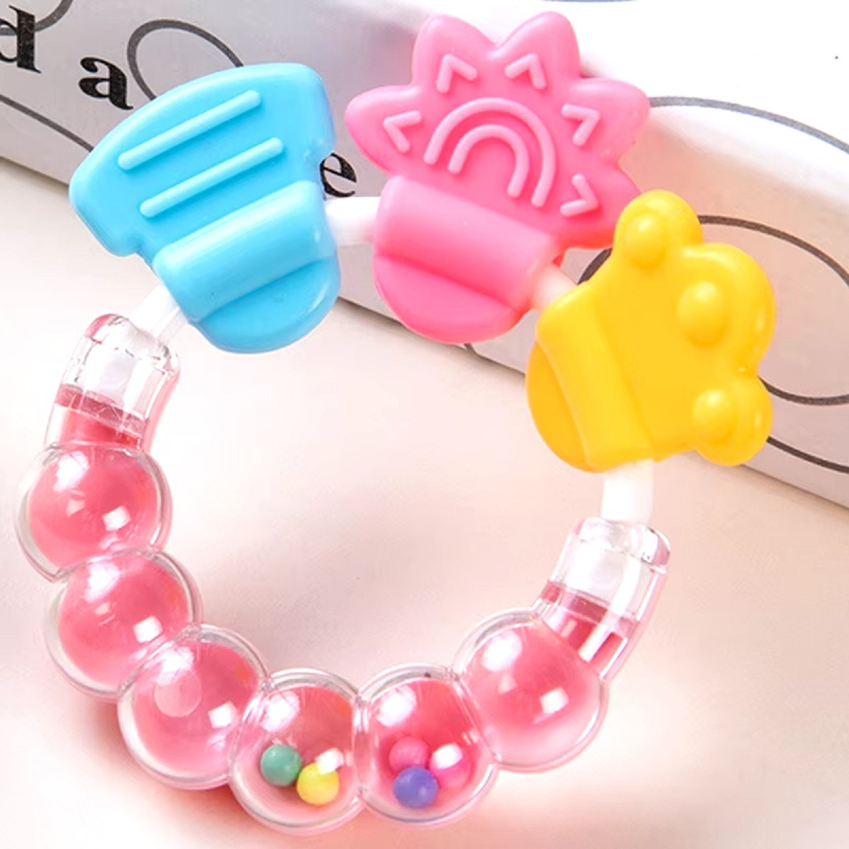 MORDEDOR SET 8 PULSERA SENSORIAL SILICONA BEBÉ LAU - 9
