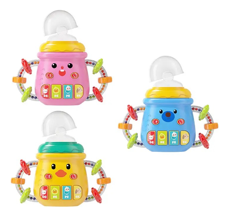 MAMADERA BIBERON SILICONA SONAJERO MUSICAL BEBES LAU - 2