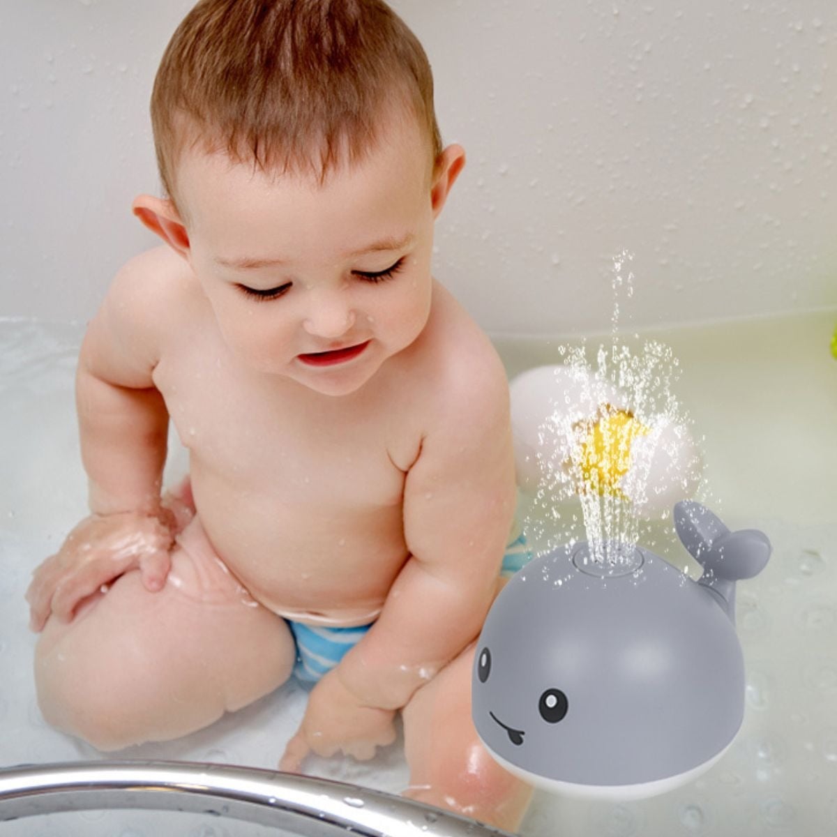 JUGUETE DE BAÑO BALLENA CON LUZ FUENTE AGUA FLOTANTE LAU - 8