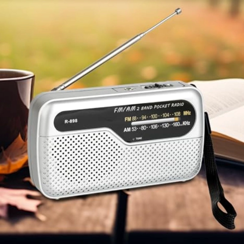 RADIO DE BOLSILLO COMPACTO PORTATIL AM/FM MUSICA LAU - 1