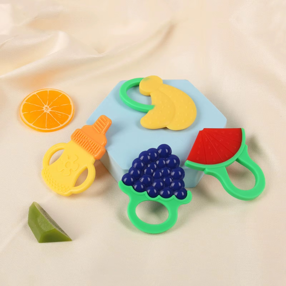 MORDEDOR SET 7 DISEÑO FRUTAS SILICONA ALIVIO BEBÉ LAU - 9
