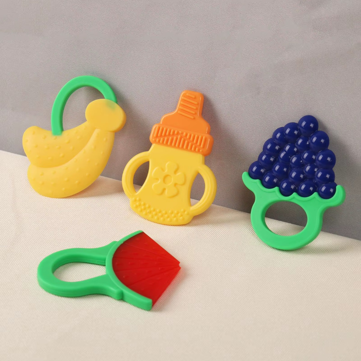 MORDEDOR SET 7 DISEÑO FRUTAS SILICONA ALIVIO BEBÉ LAU - 10