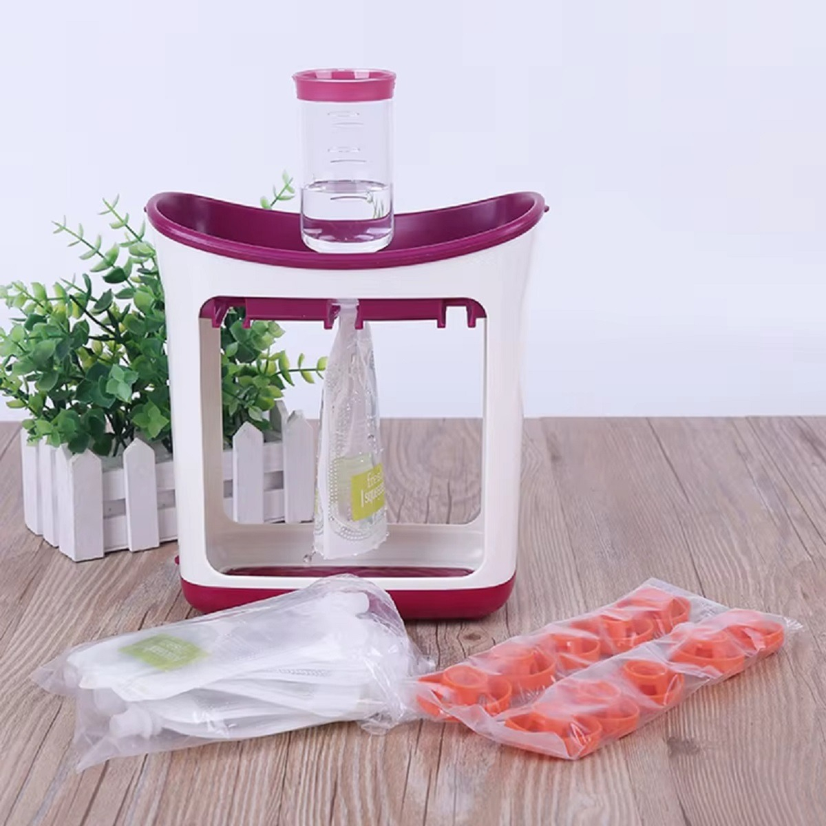 DOSIFICADOR EXPRIMIDOR JUGO ZUMO COMIDA 10 BOLSAS BEBE LAU - 7