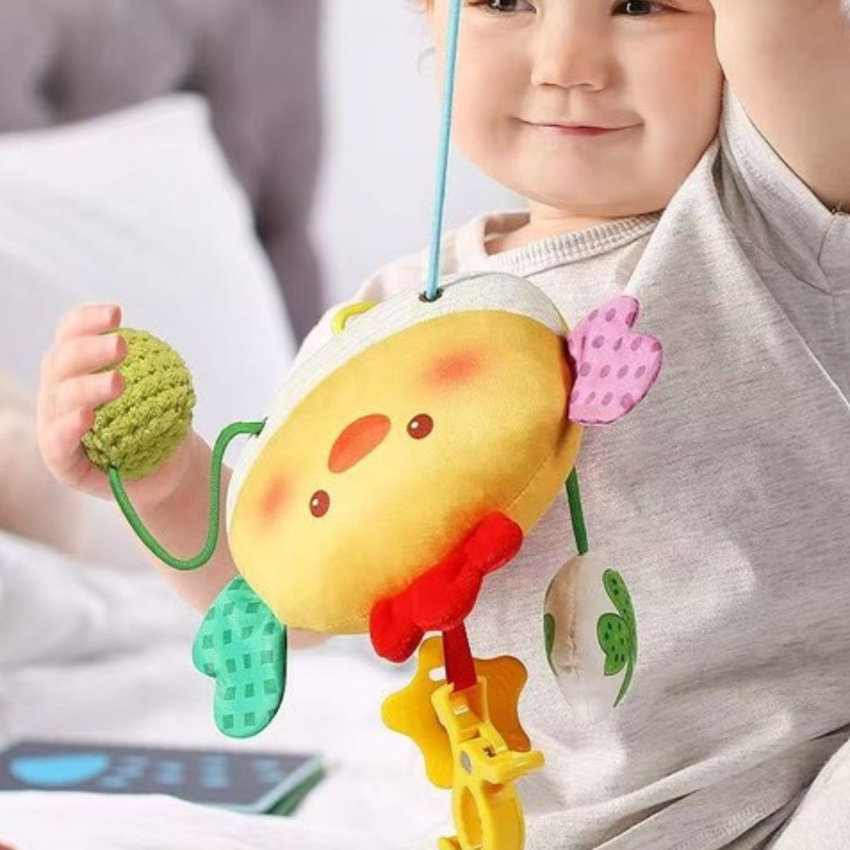 SONAJERO PELUCHE COLGANTE ESTIMULA SENSORIAL BEBE LAU - 7
