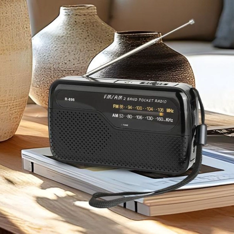 RADIO DE BOLSILLO COMPACTO PORTATIL AM/FM MUSICA LAU - 9