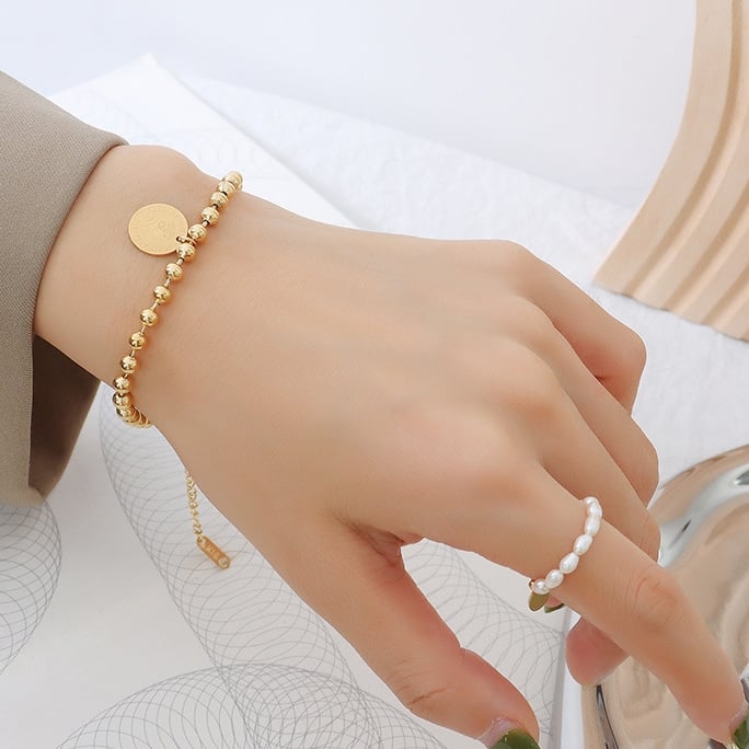 PULSERA LUX JOYAS BAÑO ORO AMARILLO 18K PELOTITAS DISCO REINA - 4