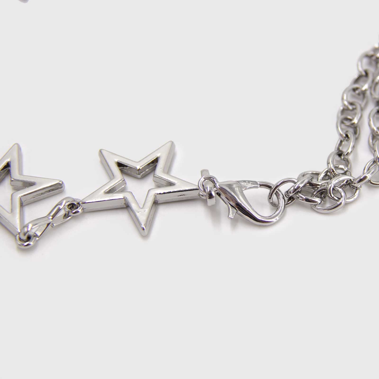 CINTURON DE CADENA CON ESTRELLAS PLATEADO - 2