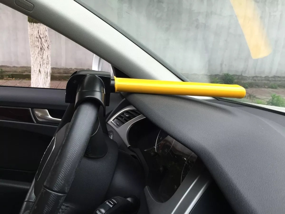 TRABA VOLANTE ANTIRROBO ACERO TRANCA CANDADO AUTOCARS - 1