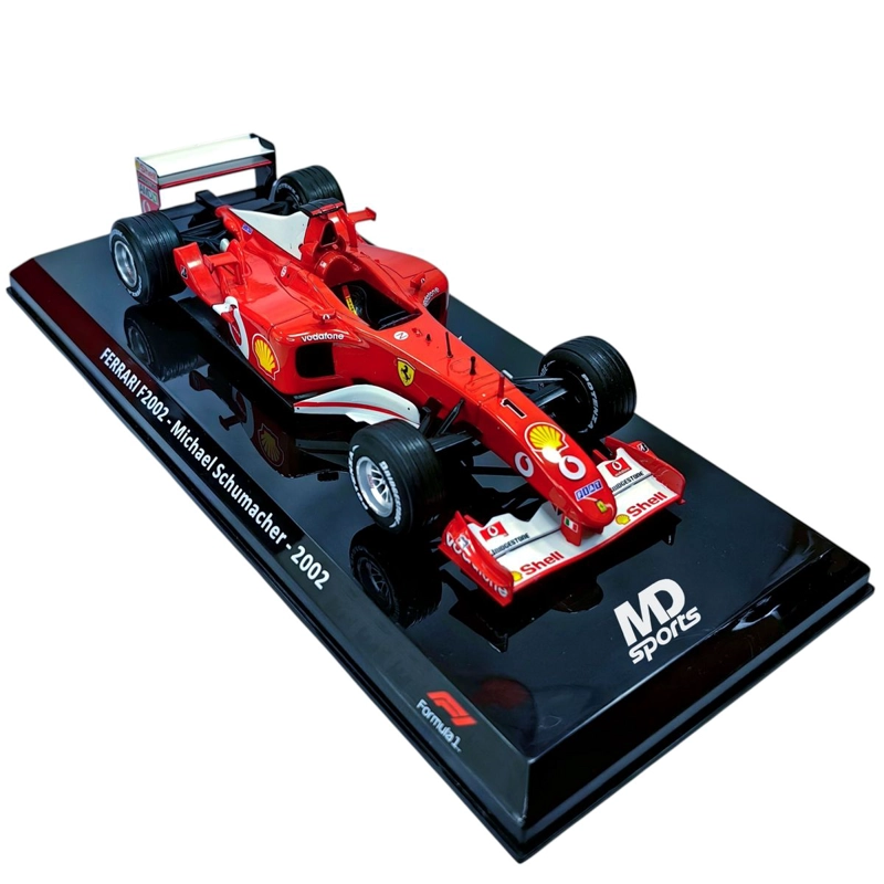 AUTO F1 FERRARI F2002 2002 #1 MICHAEL SCHUMACHER CAJA NORMAL PREMIUM COLLECT 1:24 - 1