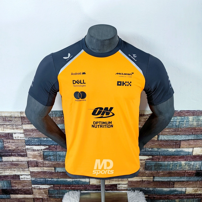 POLERA CASTORE MCLAREN F1 TEAM OFICIAL TEAMWEAR 2025 - 1