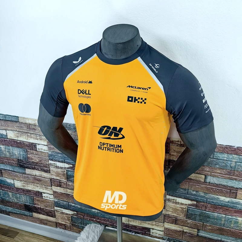 POLERA CASTORE MCLAREN F1 TEAM OFICIAL TEAMWEAR 2025 - 2