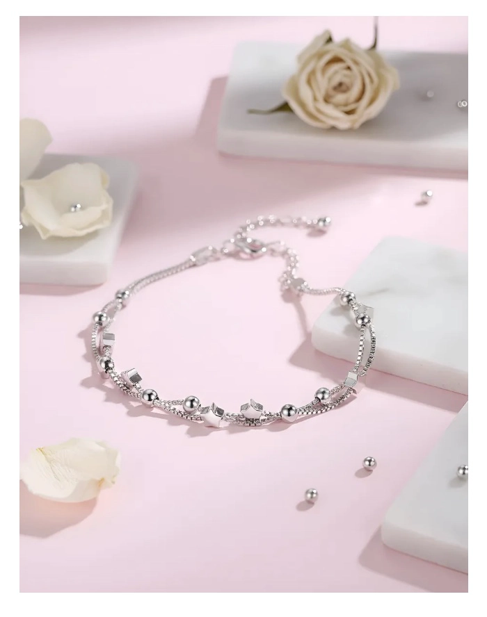 PULSERA ESTRELLAS Y ESFERAS DE PLATA - 6