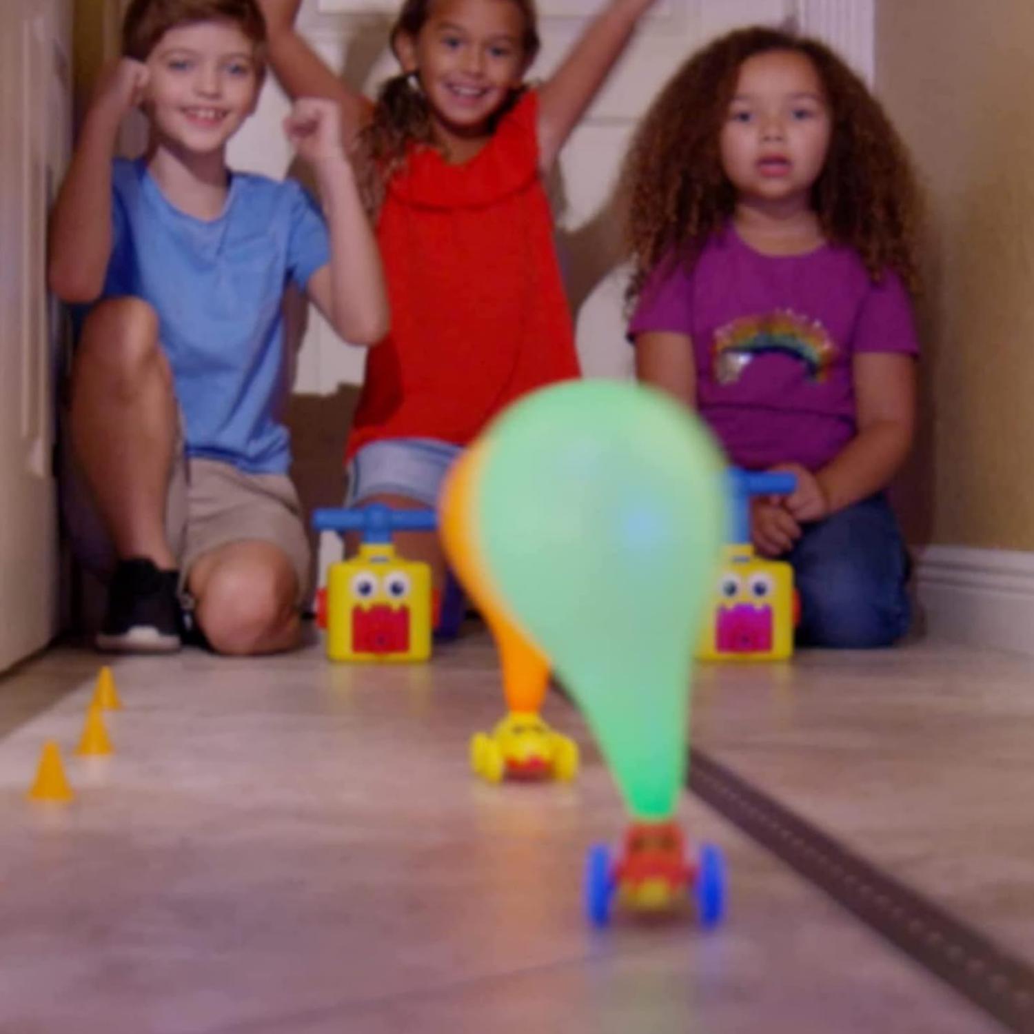 JUEGO INFLADOR DE GLOBOS PARA NIÑOS AUTOS CARRERAS CELESTE - 4