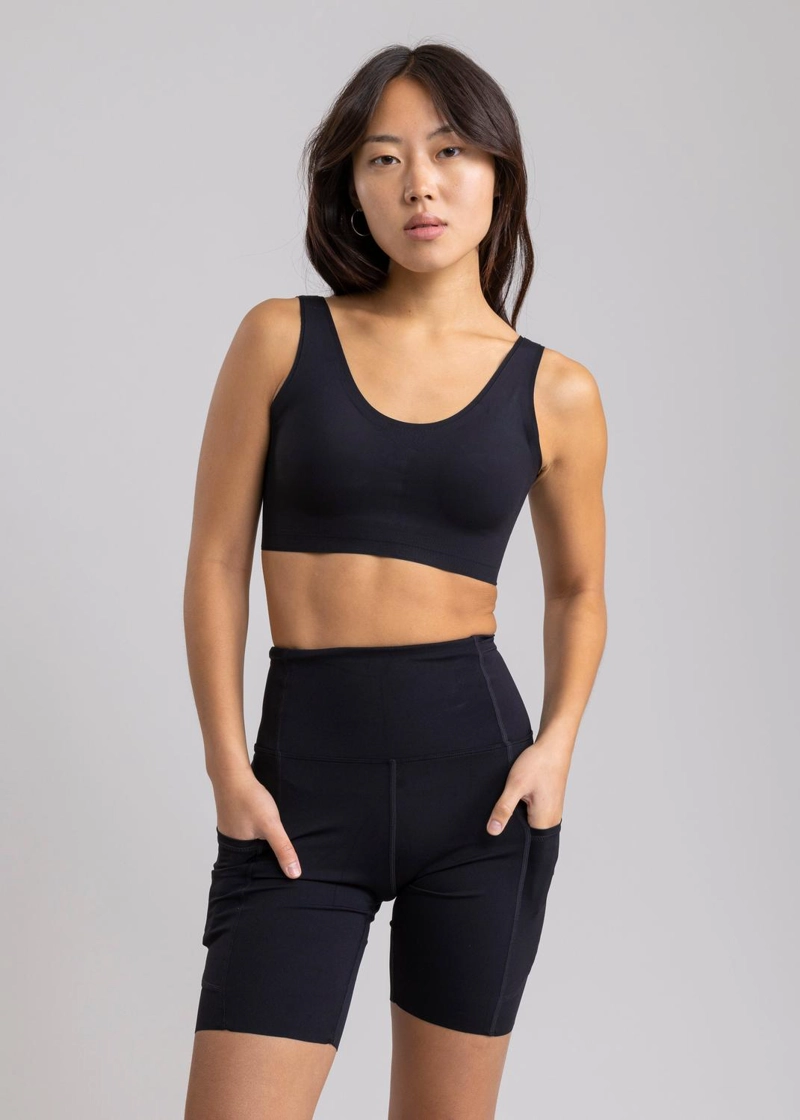 LEGGING RUNNING UNFINISHED RHEA BLACK CON 7 BOLSILLOS - 1