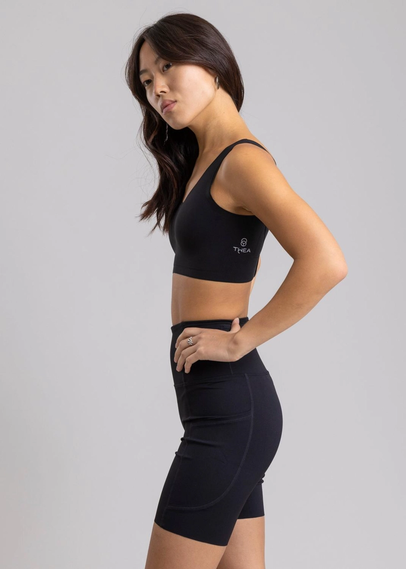 LEGGING RUNNING UNFINISHED RHEA BLACK CON 7 BOLSILLOS - 7