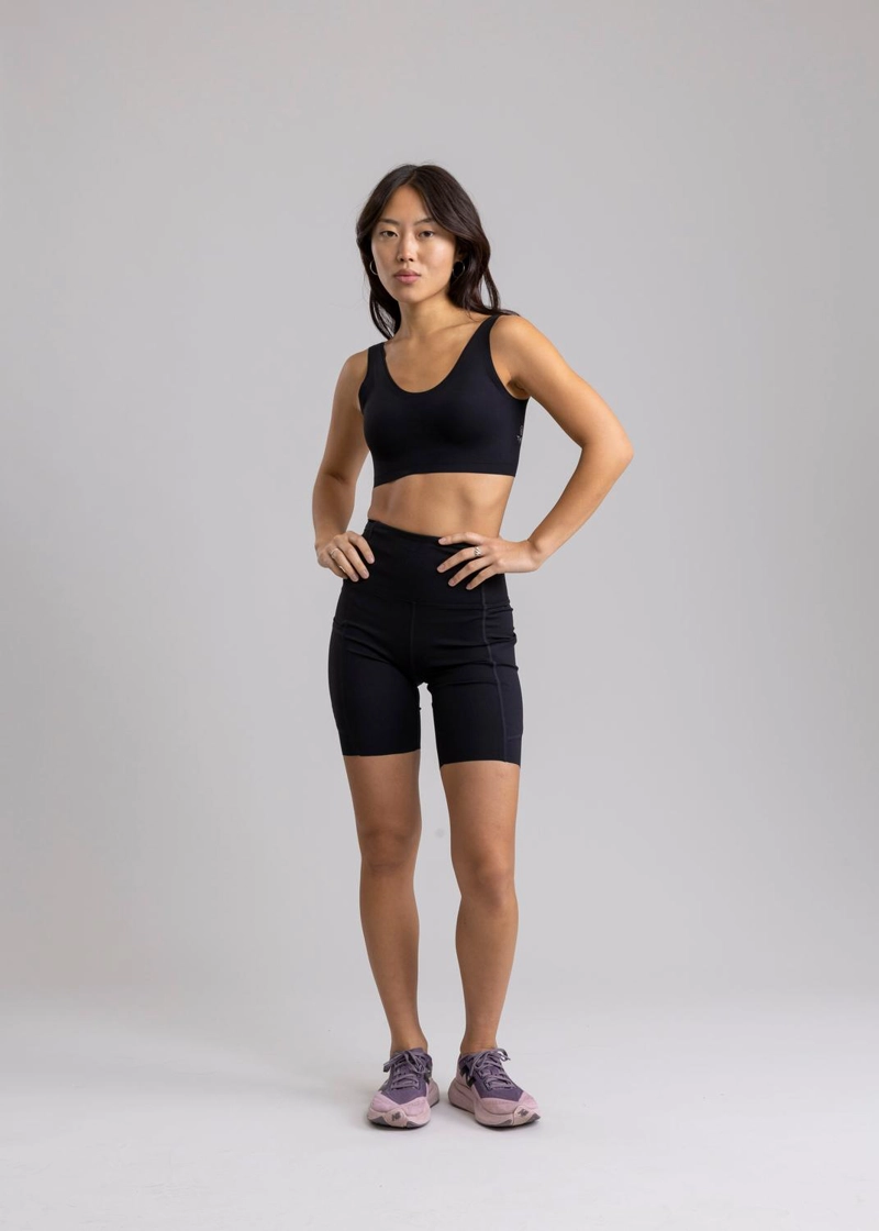LEGGING RUNNING UNFINISHED RHEA BLACK CON 7 BOLSILLOS - 9