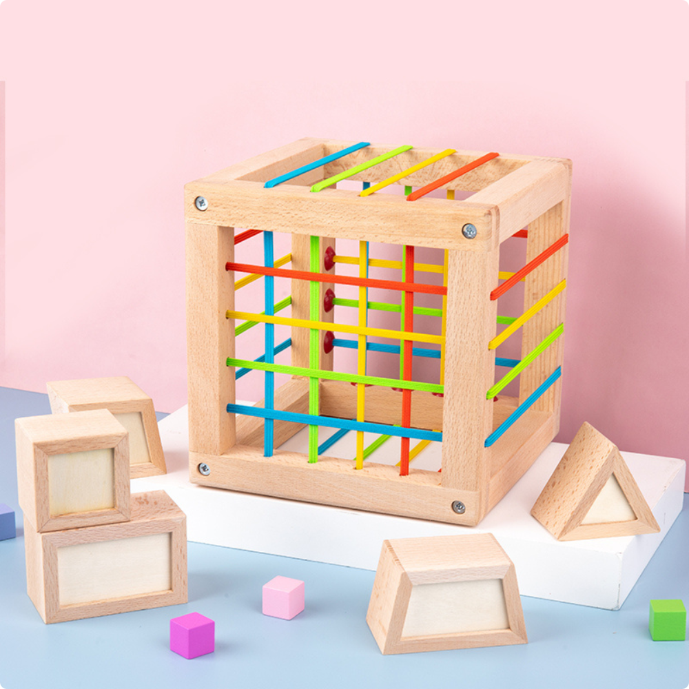 BLOQUE DE ENCAJE CON ELASTICOS DE MADERA MONTESSORI - 4