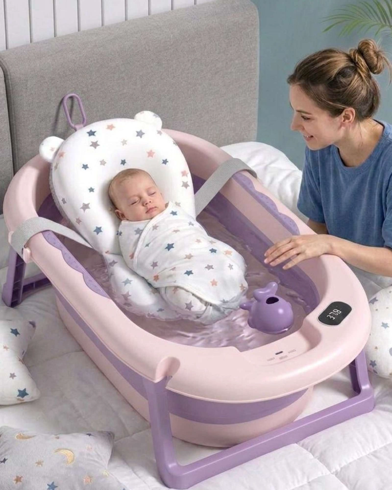 BAÑERA PLEGABLE LILA ERGONOMICA PARA BEBE  CON COJIN DE SEGURIDAD Y TERMOMETRO DIGITAL - 1
