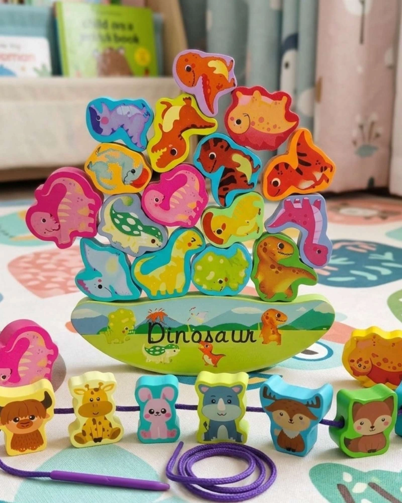 JUEGO DE EQUILIBRIO Y ENHEBRADO MONTESSORI DINOSAURIOS DE MADERA - 1