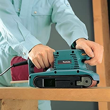 LIJADORA DE BANDA 3' X 18' (76 X 457 MM.) 650 W - VELOCIDAD VARIABLE MAKITA 9911 - 5