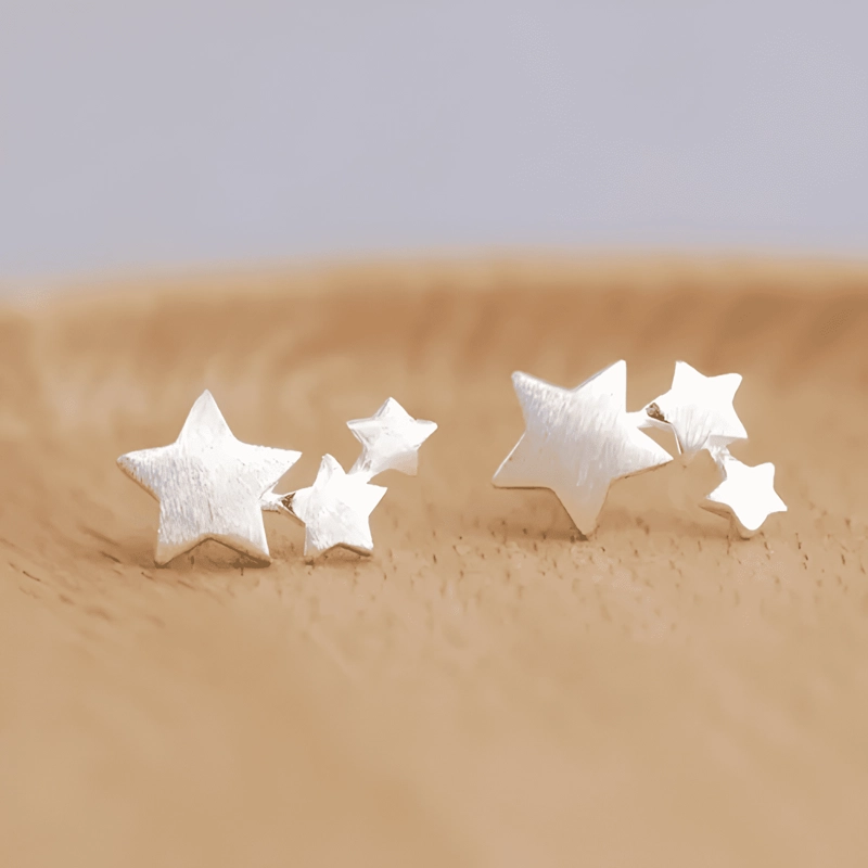 AROS TRIPLE ESTRELLA PLATEADA - 1