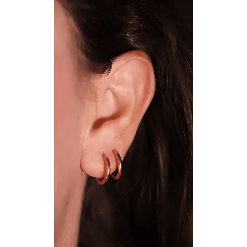ARGOLLAS LISAS AURA 10MM TITANIO ASTM F136 CHAPADO DORADO - 1