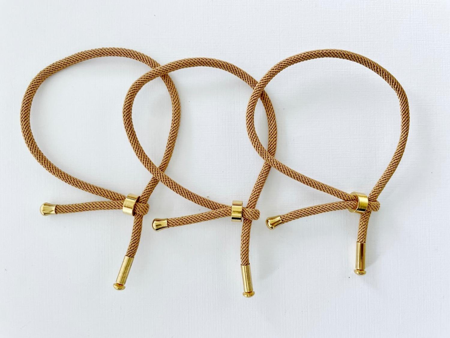 SET X 3 PULSERAS CERRADAS DE CORDÓN CASTAÑO - 1