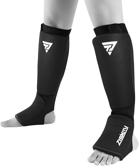 CANILLERA GEL IMPACT EN COLOR NEGRO PARA ARTES MARCIALES - 1