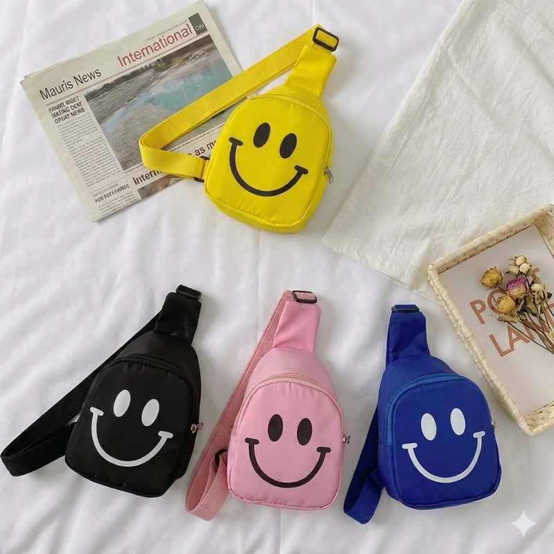 MINI MOCHILA BANDOLERA INFANTIL CARITA FELIZ - 1
