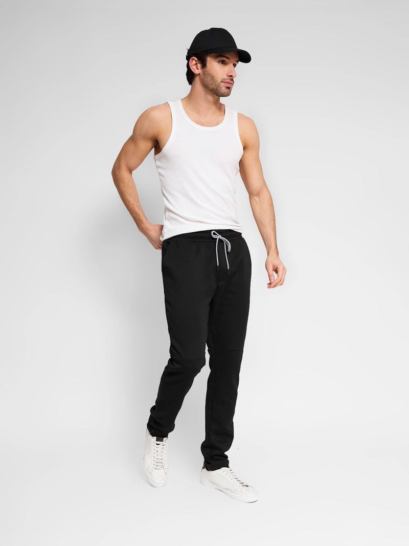 PANTALÓN BUZO HOMBRE REVUP SKINNY - 1