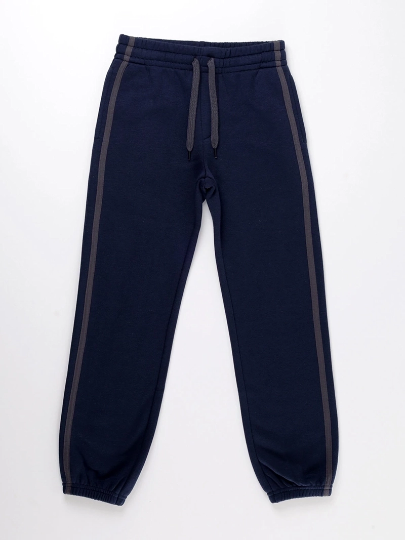 PANTALÓN DE BUZO NIÑO HARVEST LINEA LATERAL - 1
