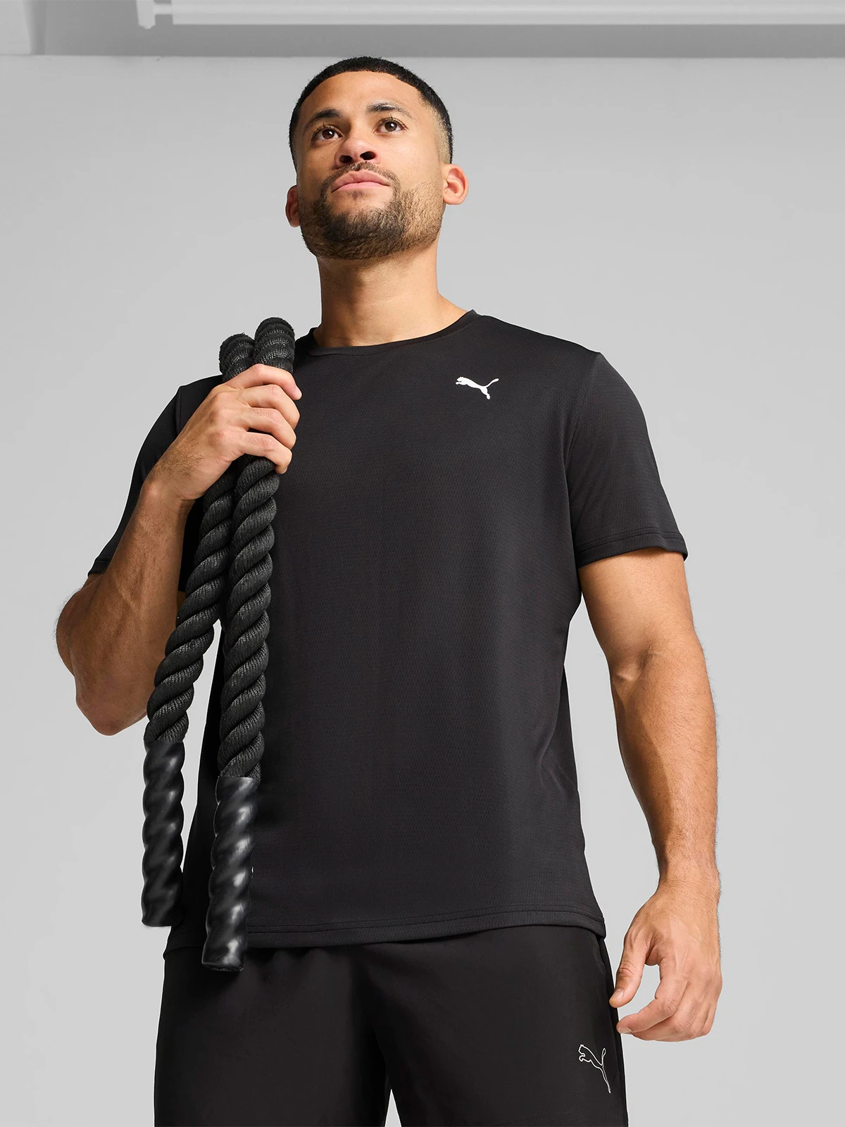 POLERA HOMBRE PUMA 527155 NEGRO MANGA CORTA ESSENTIALS TRAIN ALL DAY