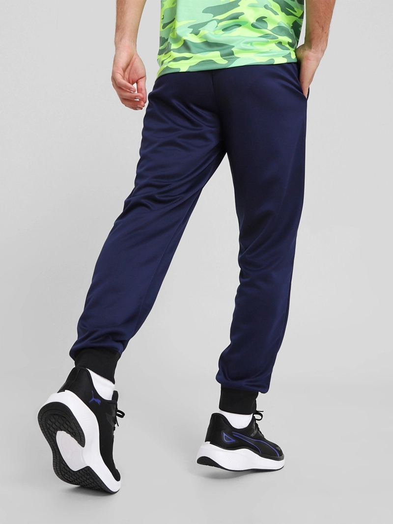 PANTALÓN DE BUZO HOMBRE PUMA 682649 AZUL LOGO POLY ESS N.1 - 2