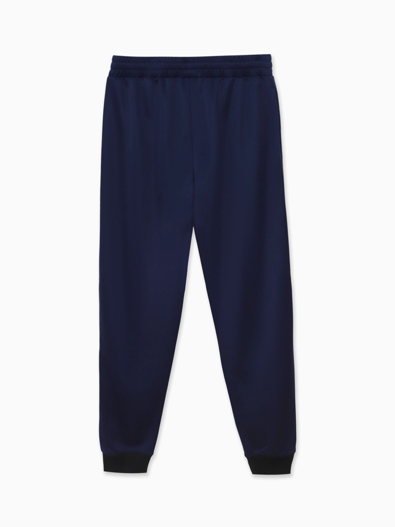 PANTALÓN DE BUZO HOMBRE PUMA 682649 AZUL LOGO POLY ESS N.1 - 4