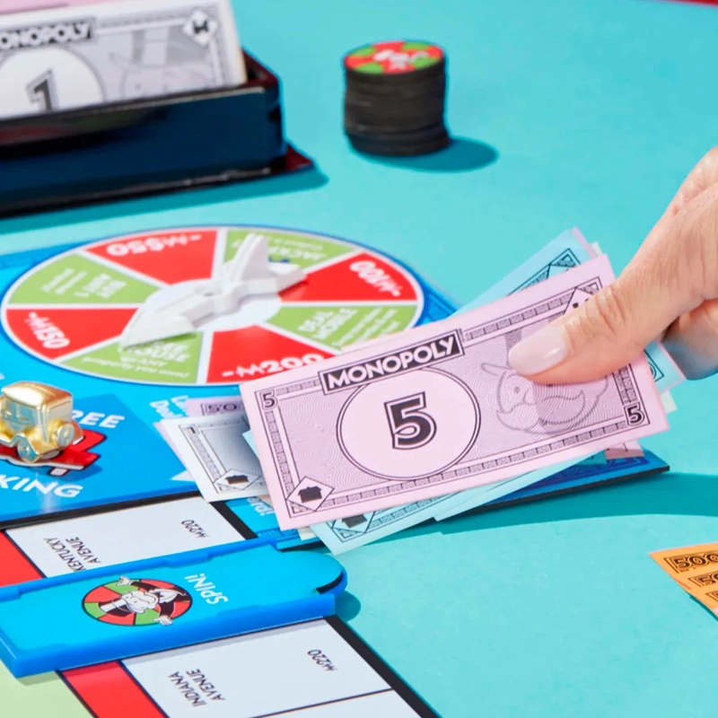 JUEGO DE MESA MONOPOLY EXPANSIÓN PARADA LIBRE: GRAN PREMIO - 14