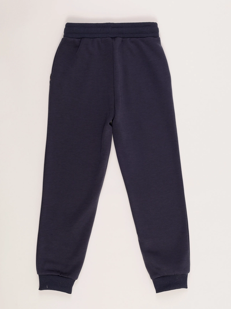 PANTALÓN DE BUZO NIÑA HARVEST LISO - 2