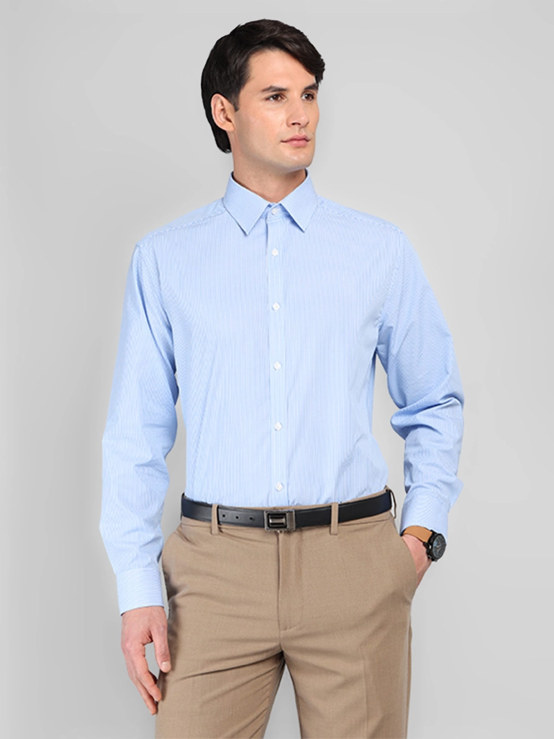 CAMISA HOMBRE VAN HEUSEN MANGA LARGA TAILORED FIT DISEÑO A RAYAS CUELLO ITALIANO PUÑO SIMPLE
