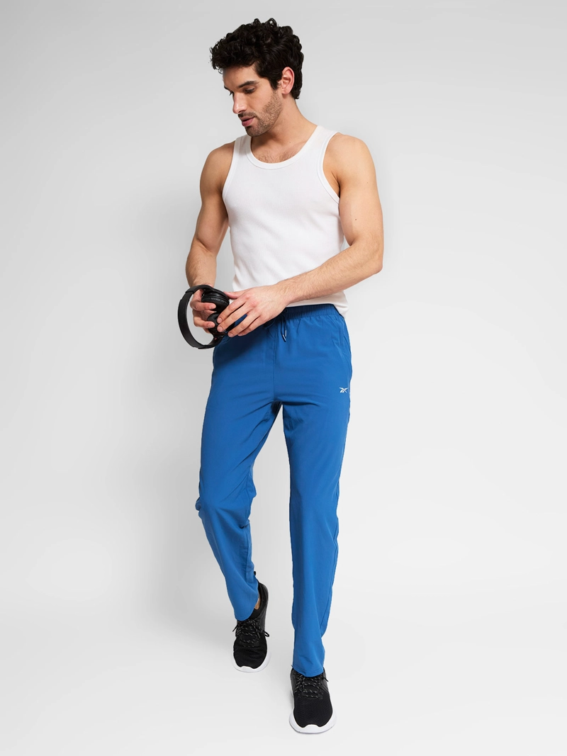 PANTALÓN DE BUZO HOMBRE REEBOK ID TRAIN - 1
