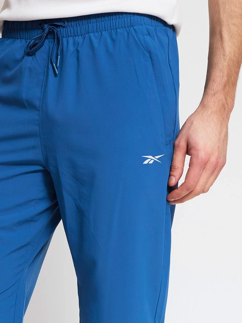 PANTALÓN DE BUZO HOMBRE REEBOK ID TRAIN - 4