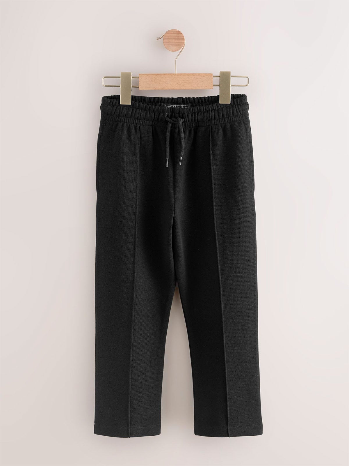 NEXT PANTALÓN DE BUZO NIÑO NEXT