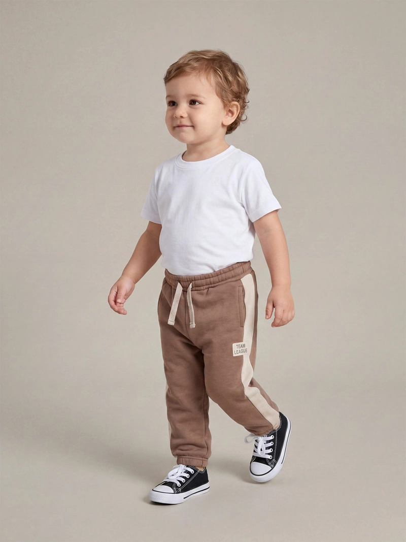 BABY HARVEST PANTALÓN DE BUZO NIÑO BABY HARVEST CON FRANJA LATERAL