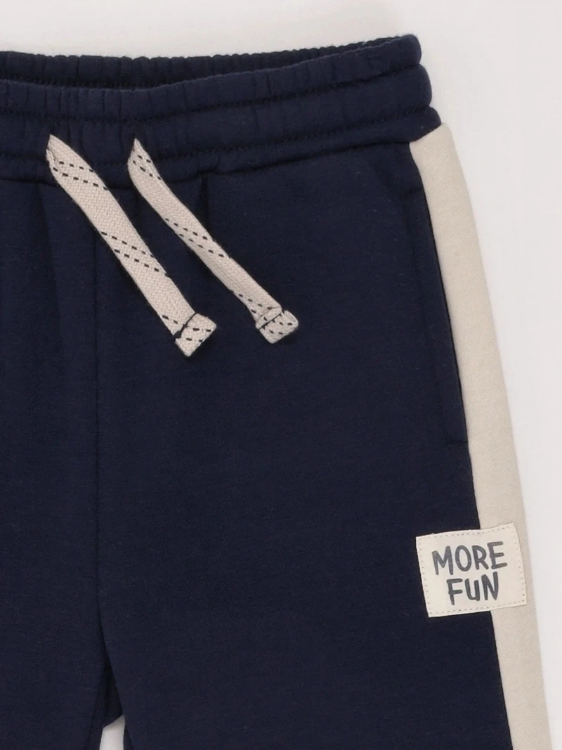 PANTALÓN DE BUZO NIÑO BABY HARVEST CON FRANJA LATERAL - 5