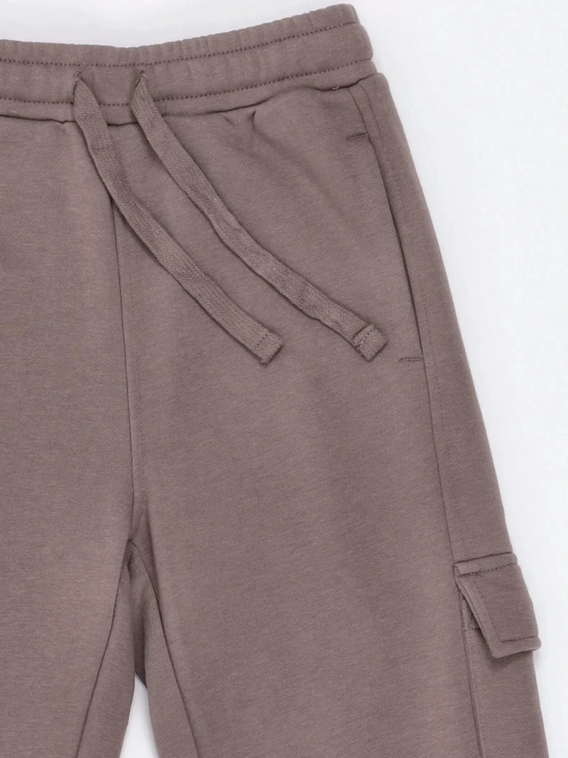 PANTALÓN DE BUZO NIÑO HARVEST BOLSILLO CARGO - 5