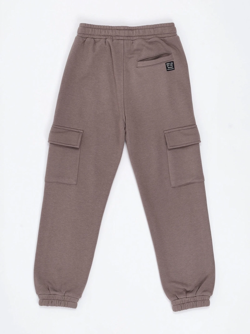 PANTALÓN DE BUZO NIÑO HARVEST BOLSILLO CARGO - 4
