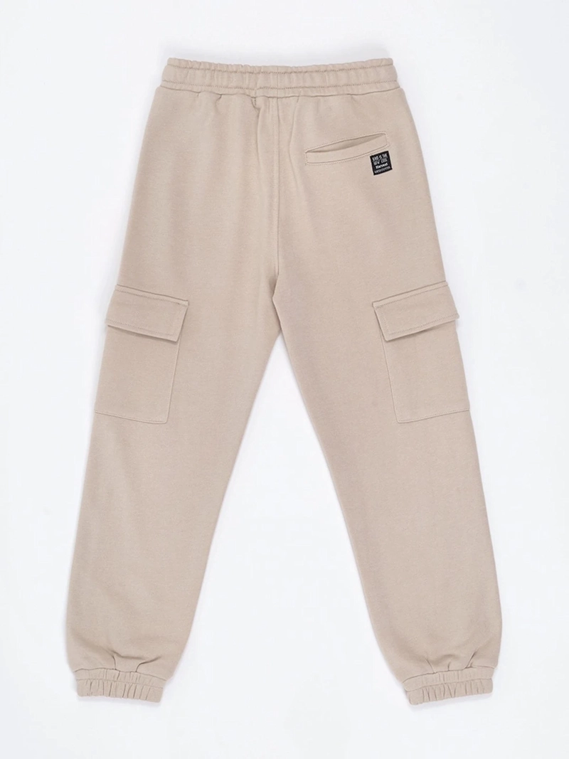 PANTALÓN DE BUZO NIÑO HARVEST BOLSILLO CARGO - 4