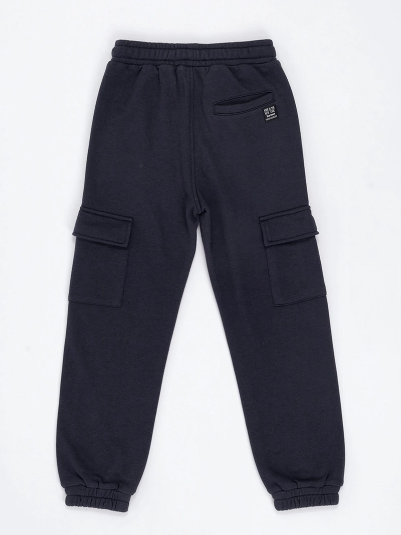 PANTALÓN DE BUZO NIÑO HARVEST BOLSILLO CARGO - 4