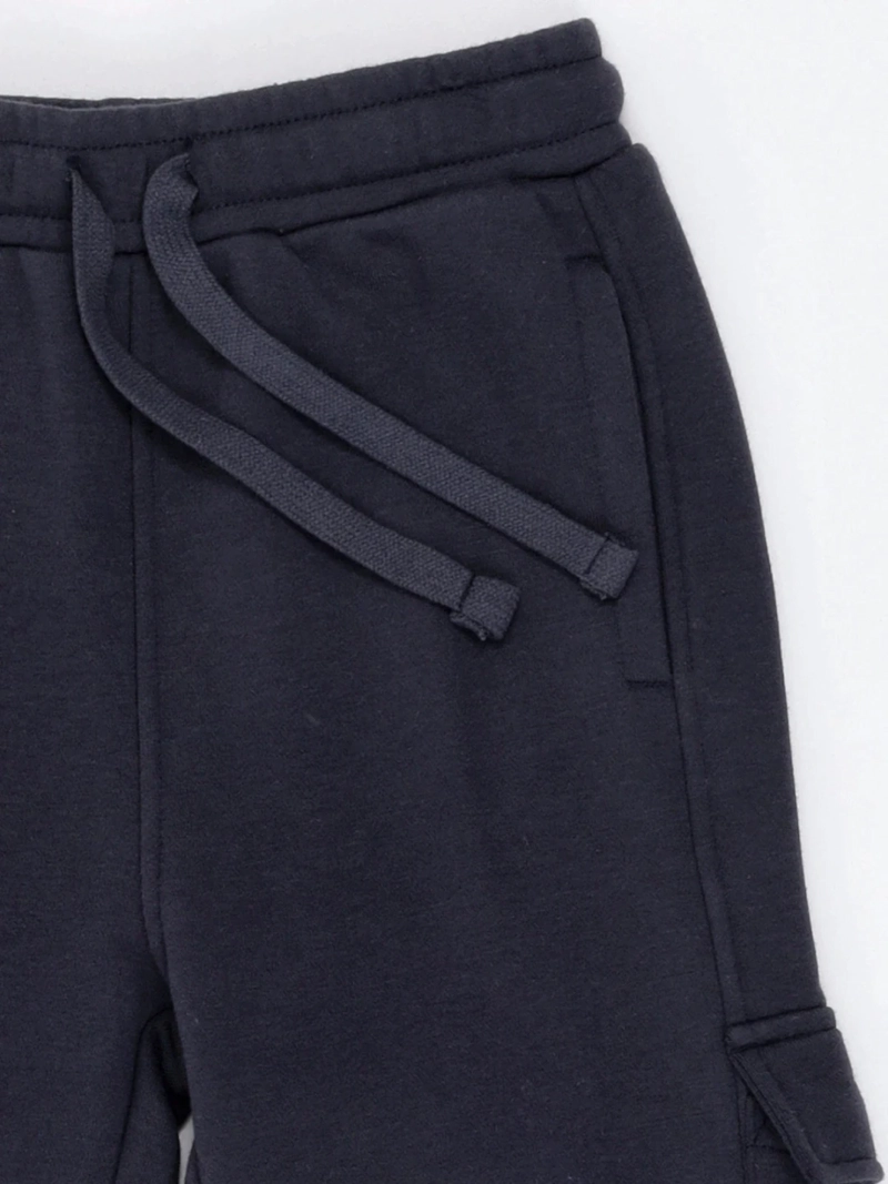 PANTALÓN DE BUZO NIÑO HARVEST BOLSILLO CARGO - 5