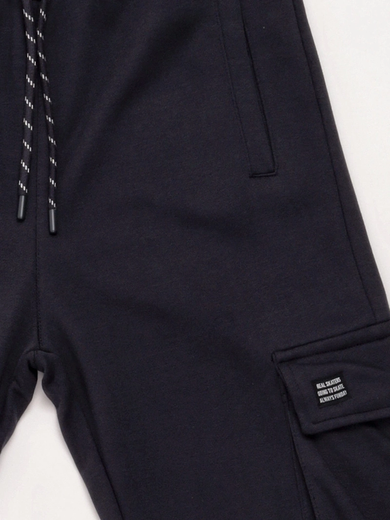 PANTALÓN DE BUZO NIÑO CLOUDBREAK ALGODÓN BOLSILLO CARGO - 6