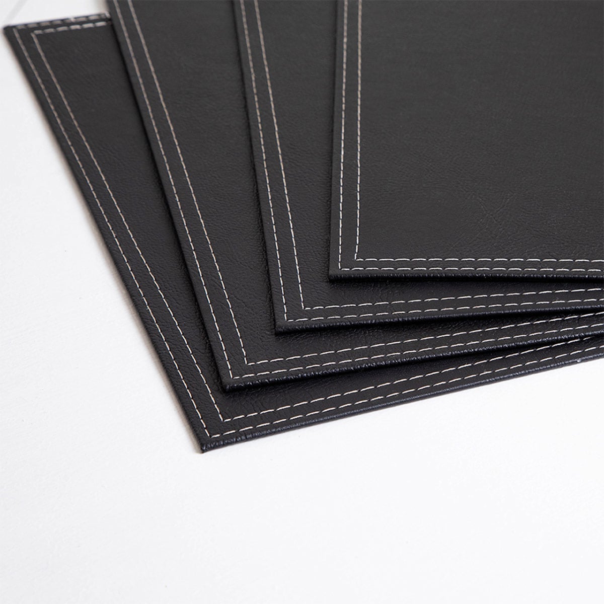 SET 4 INDIVIDUALES DORAL RECTANGULAR ECO CUERO NEGRO