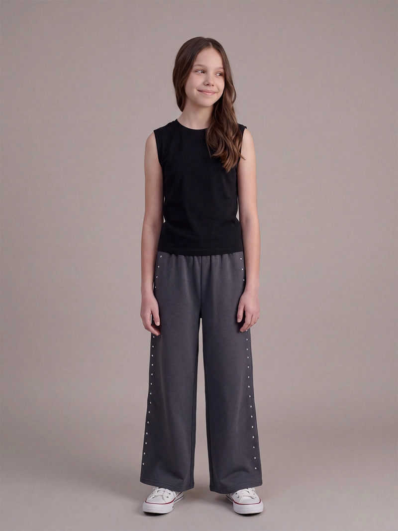 PANTALÓN DE BUZO NIÑA INDEX TEEN ALGODÓN WIDE TACHAS